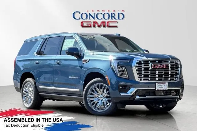2026 GMC Yukon Denali in Downpour Metallic — front three-quarter view