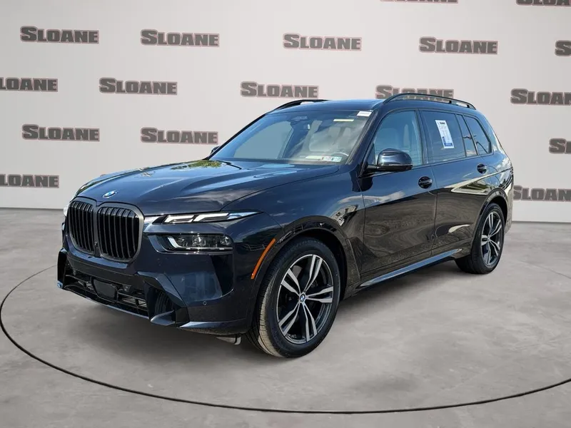 2025 BMW X7 xDrive40i M Sport in Carbon Black Metallic — front three-quarter view