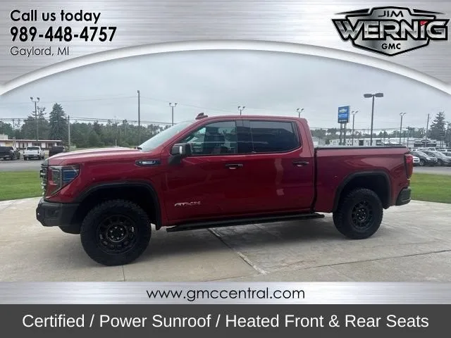 2024 GMC Sierra 1500 AT4X in Volcanic Red Tintcoat — front three-quarter view