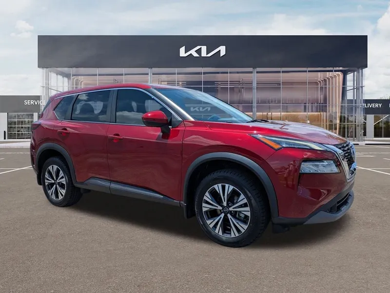 2022 Nissan Rogue SV in Scarlet Ember Tintcoat — front three-quarter view