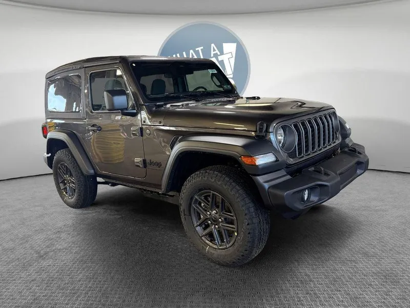 2026 Jeep Wrangler Sport S in Granite Crystal Metallic Clear-Coat Exterior Paint — front three-quarter view