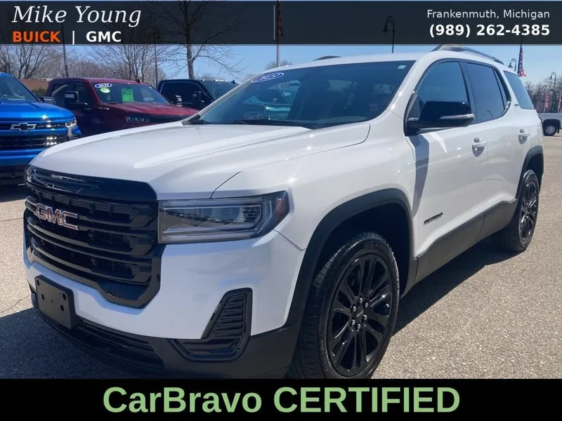 2023 GMC Acadia SLE in Summit White — front three-quarter view