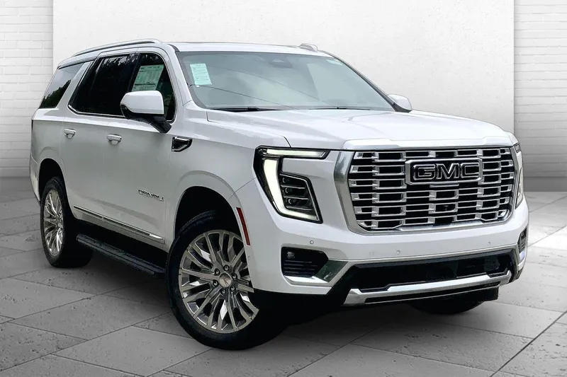 2026 GMC Yukon Denali in Summit White — front three-quarter view