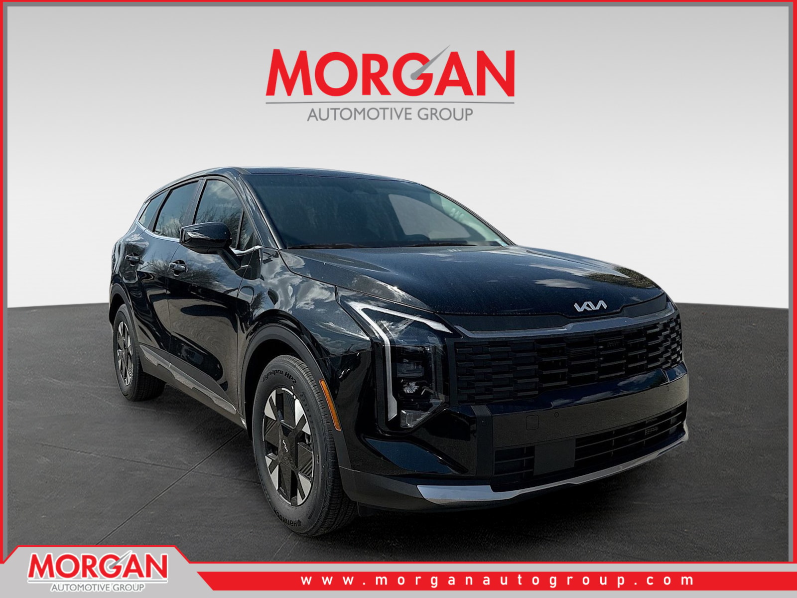 2026 Kia Sportage Hybrid LX in Fusion Black — front three-quarter view