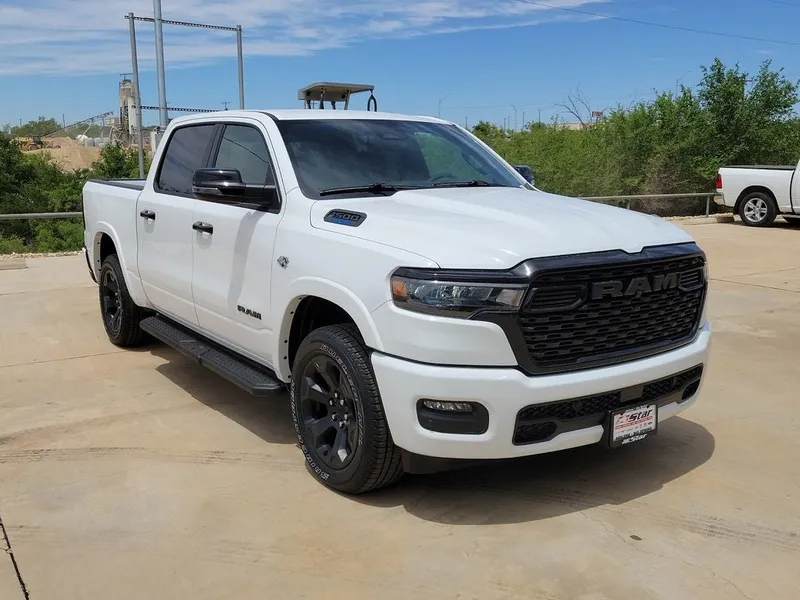 2026 RAM 1500 Big Horn/Lone Star in Bright White Clearcoat — front three-quarter view