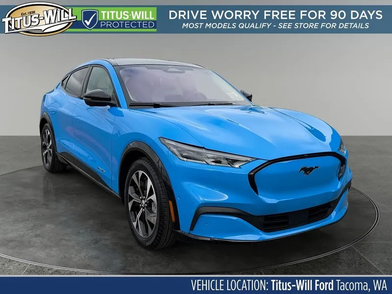 2023 Ford Mustang Mach-E Premium in Grabber Blue Metallic — front three-quarter view