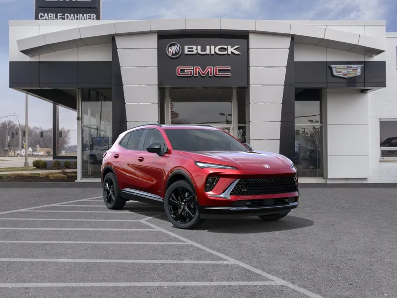 2026 Buick Envision Sport Touring in Brilliant Red — front three-quarter view