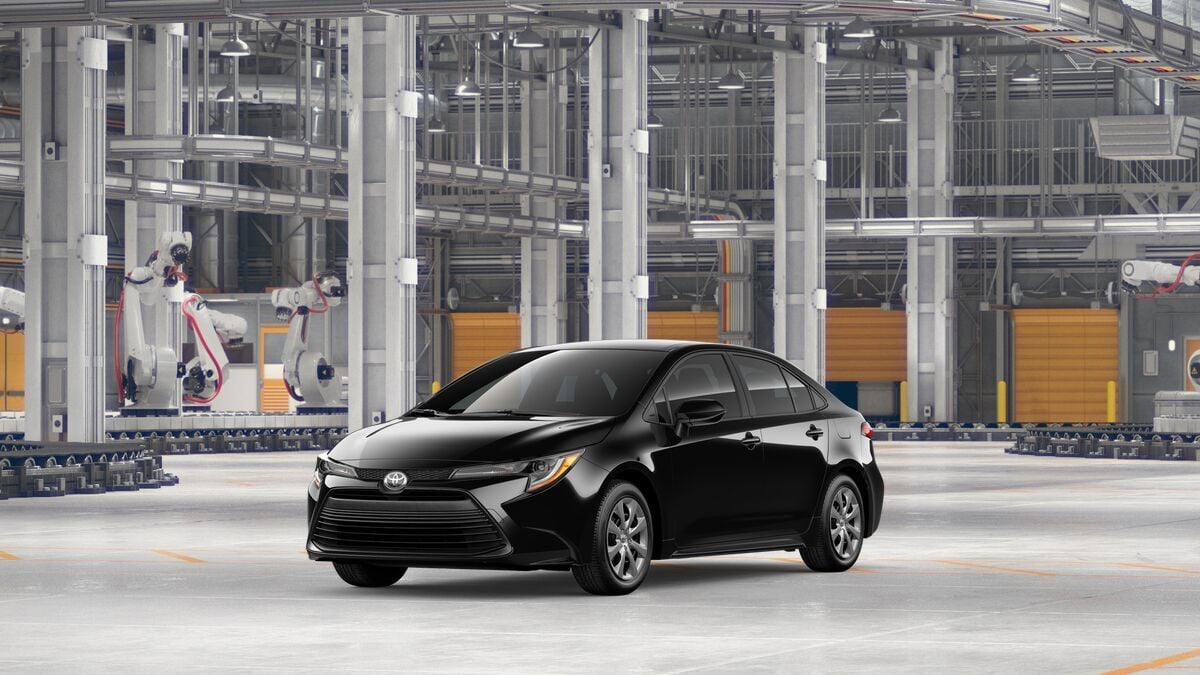 2026 Toyota Corolla LE in Midnight Black Metallic — front three-quarter view