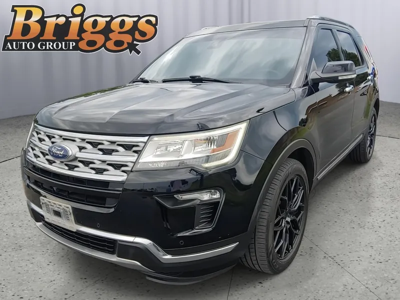 2018 Ford Explorer Limited in Shadow Black — front three-quarter view