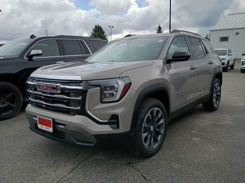 2026 GMC Terrain Elevation in Riverstone Metallic — front three-quarter view