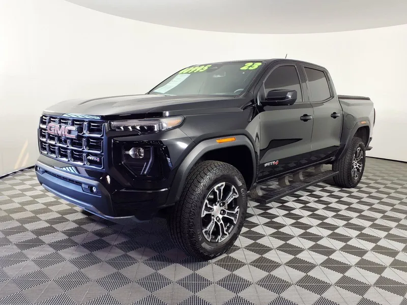2023 GMC Canyon 4WD AT4 in Onyx Black — front three-quarter view