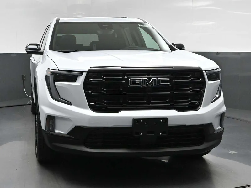 2026 GMC Acadia Elevation in Glacier White Tricoat — front three-quarter view