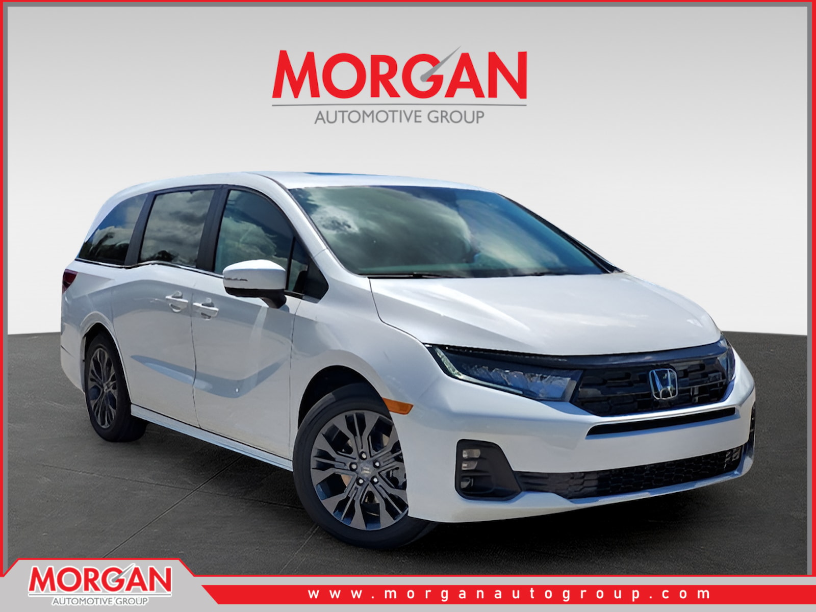 2026 Honda Odyssey Touring in Platinum White Pearl — front three-quarter view