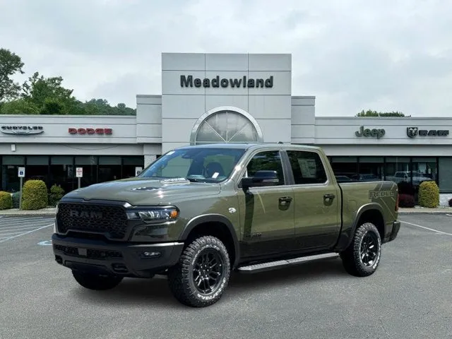 2026 RAM 1500 Rebel in Tank Exterior Paint — front three-quarter view