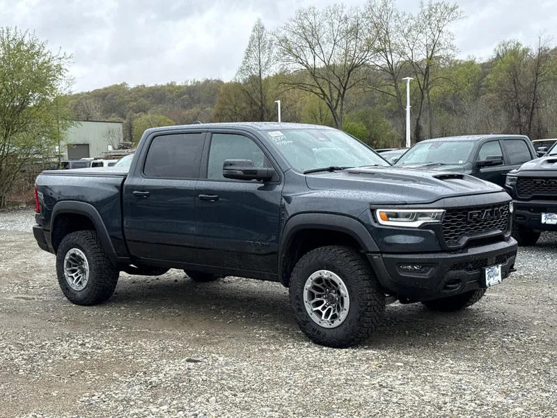 2026 RAM 1500 RHO in Forged Blue Metallic — front three-quarter view