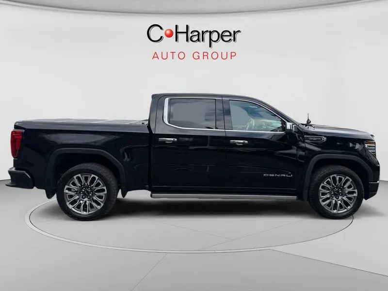 2023 GMC Sierra 1500 Denali Ultimate in Onyx Black — front three-quarter view
