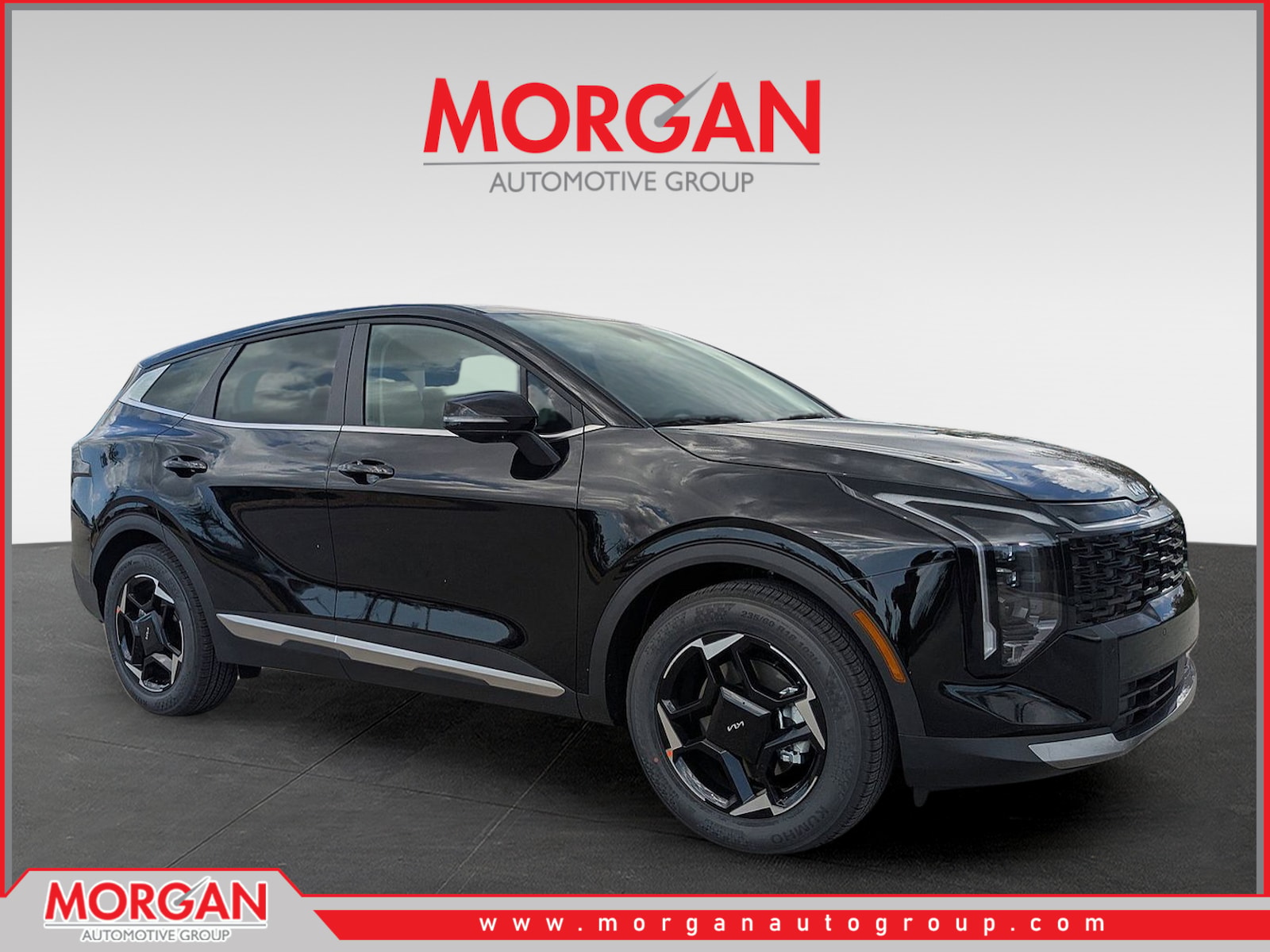 2026 Kia Sportage EX in Ebony Black — front three-quarter view