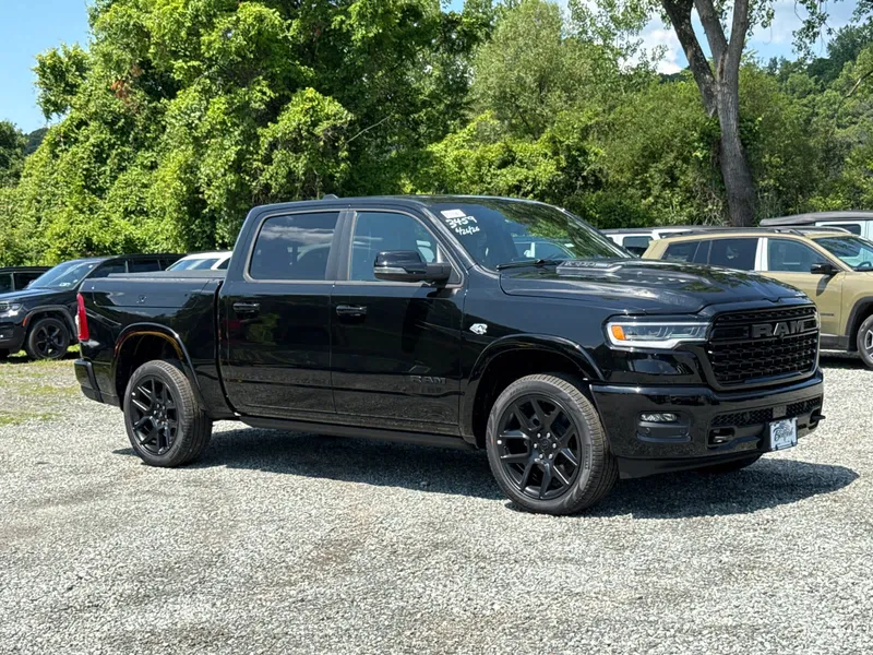 2026 RAM 1500 Limited in Diamond Black Crystal Pearlcoat — front three-quarter view
