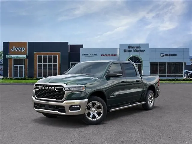 2026 RAM Ram 1500 RAM 1500 BIG HORN CREW CAB 4X4 5'7' BOX in Serrano-Green Metallic Exterior Paint — front three-quarter view