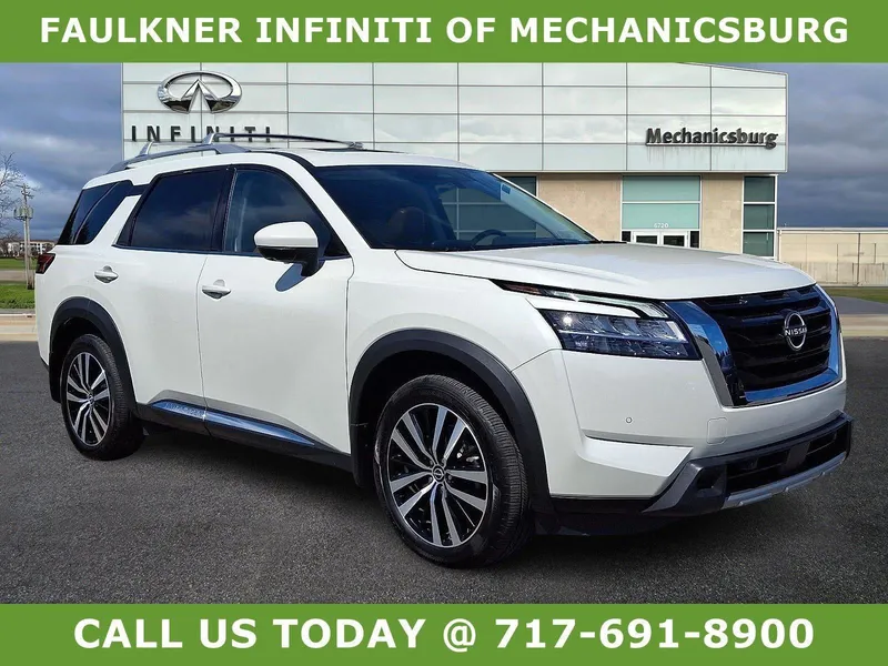 2023 Nissan Pathfinder Platinum 4WD in Pearl White Tricoat — front three-quarter view