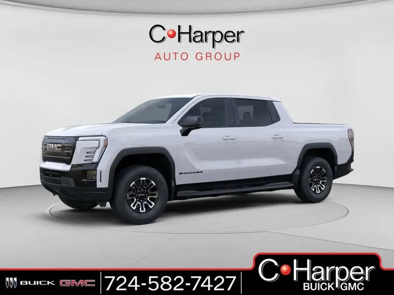 2026 GMC Sierra EV Elevation Standard Range in Summit White — front three-quarter view