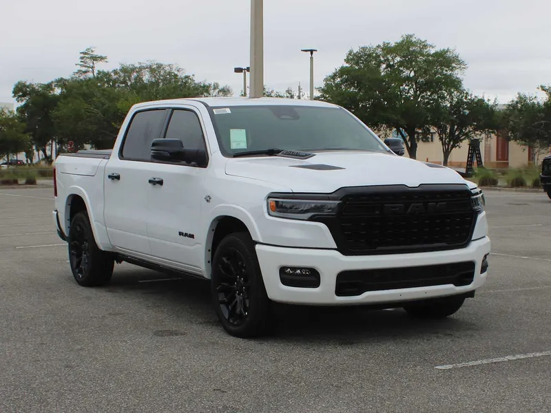 2026 RAM 1500 Limited in Ivory White Tri-Coat Pearl-Coat Exterior Paint — front three-quarter view