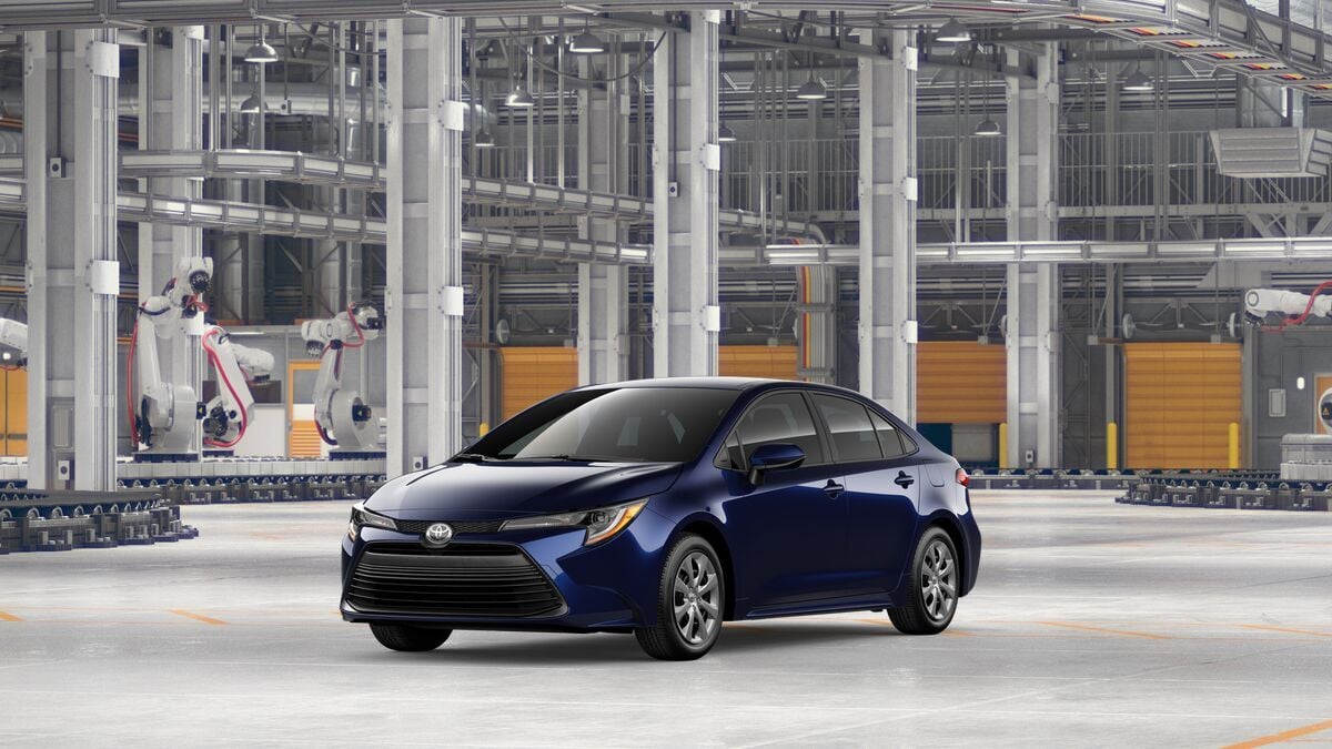 2026 Toyota Corolla LE in Blueprint — front three-quarter view