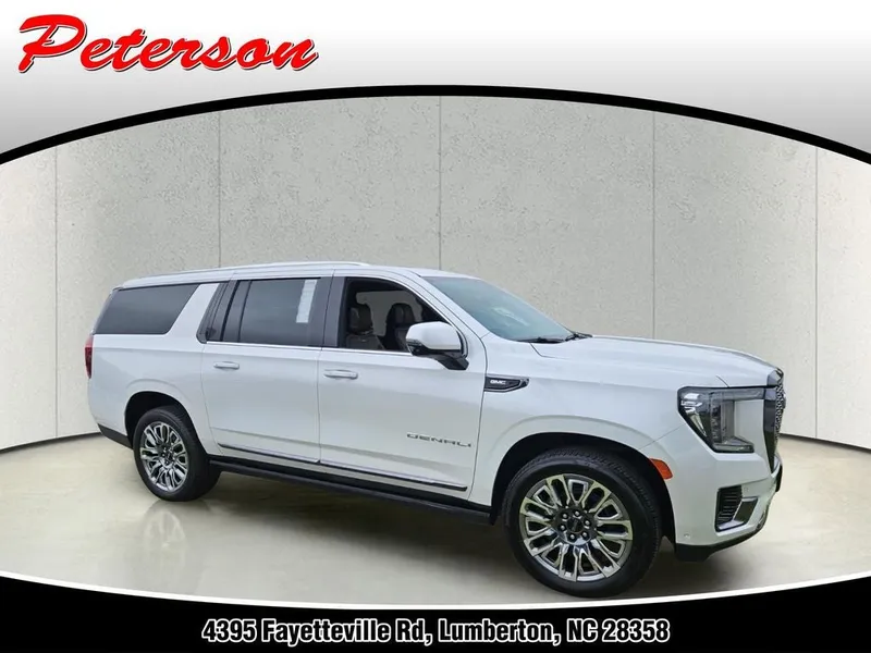2024 GMC Yukon XL 4WD Denali Ultimate in White Frost Tricoat — front three-quarter view
