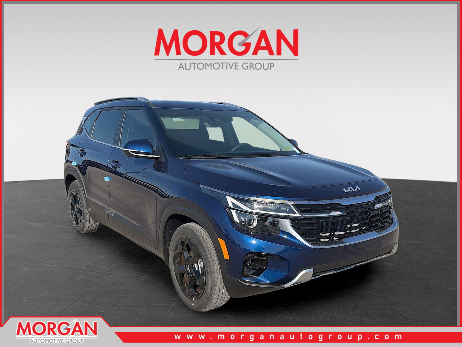 2026 Kia Seltos EX in Dark Ocean Blue — front three-quarter view