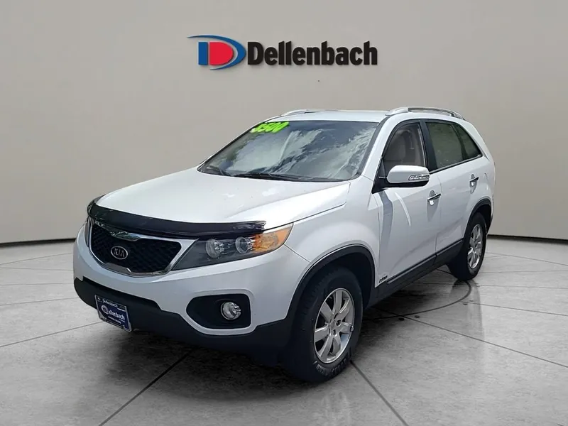 2011 Kia Sorento LX in Snow White Pearl — front three-quarter view