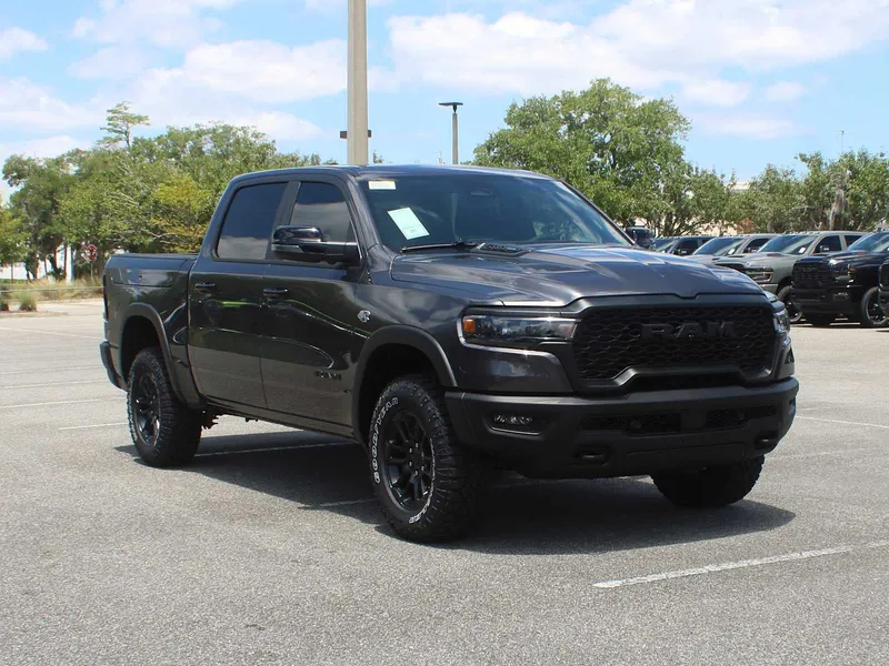 2026 RAM 1500 Rebel in Granite Crystal Metallic Clear-Coat Exterior Paint — front three-quarter view