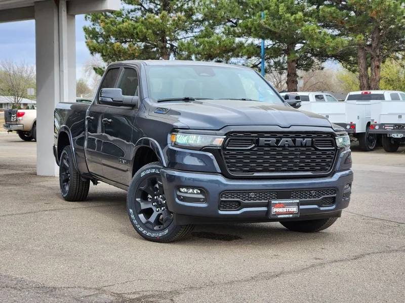 2026 RAM 1500 RAM 1500 BIG HORN QUAD CAB 4X4 6'4' BOX in Forged Blue Metallic Exterior Paint — front three-quarter view
