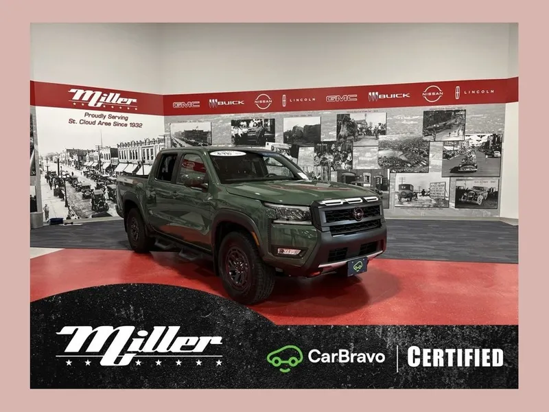 2026 Nissan Frontier PRO-4X CarBravo Certified in Tactical Green Metallic — front three-quarter view