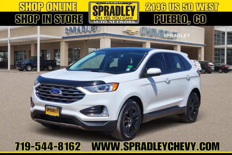 2020 Ford Edge SEL in White — front three-quarter view