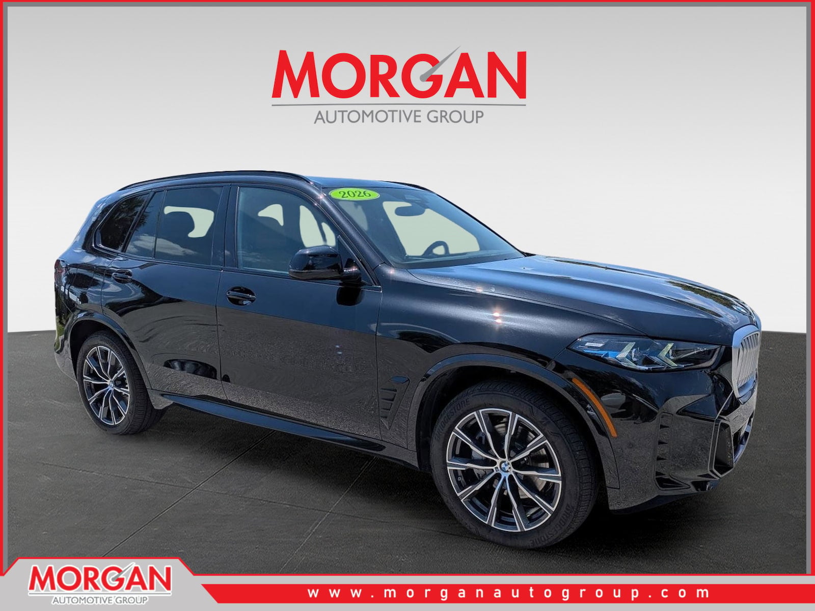2026 BMW X5 sDrive40i in Black Sapphire Metallic — front three-quarter view