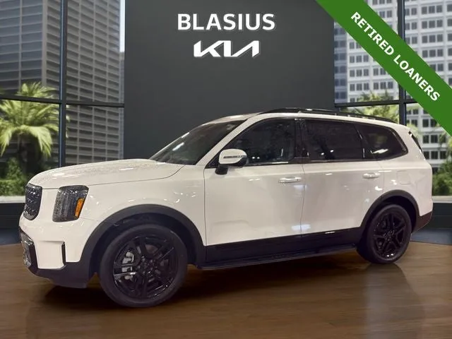 2025 Kia Telluride EX X-Line in Glacial White Pearl — front three-quarter view