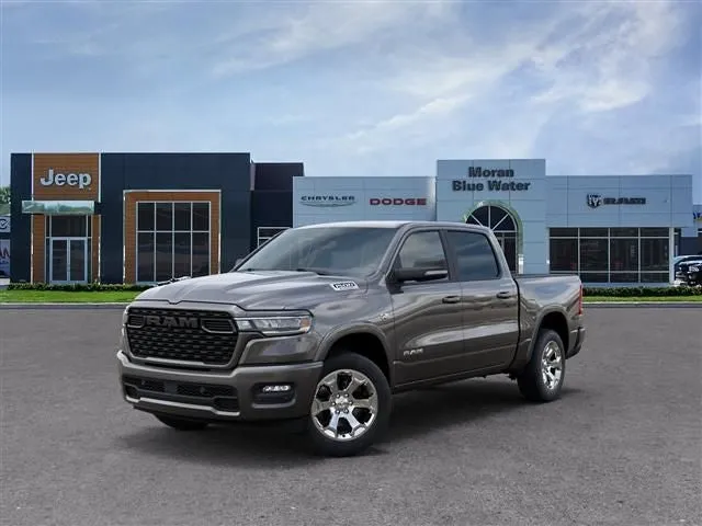 2026 RAM Ram 1500 RAM 1500 BIG HORN CREW CAB 4X4 5'7' BOX in Granite Crystal Metallic Clear-Coat Exterior Paint — front three-quarter view