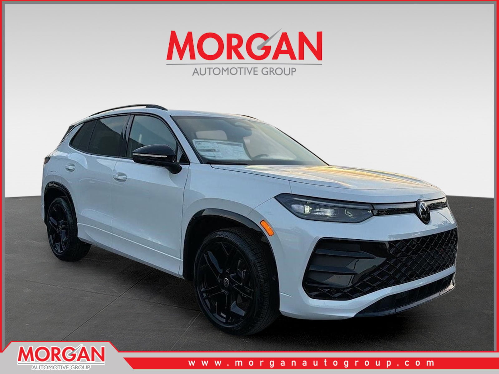 2026 Volkswagen Tiguan SE R-Line Black in White Pearl — front three-quarter view