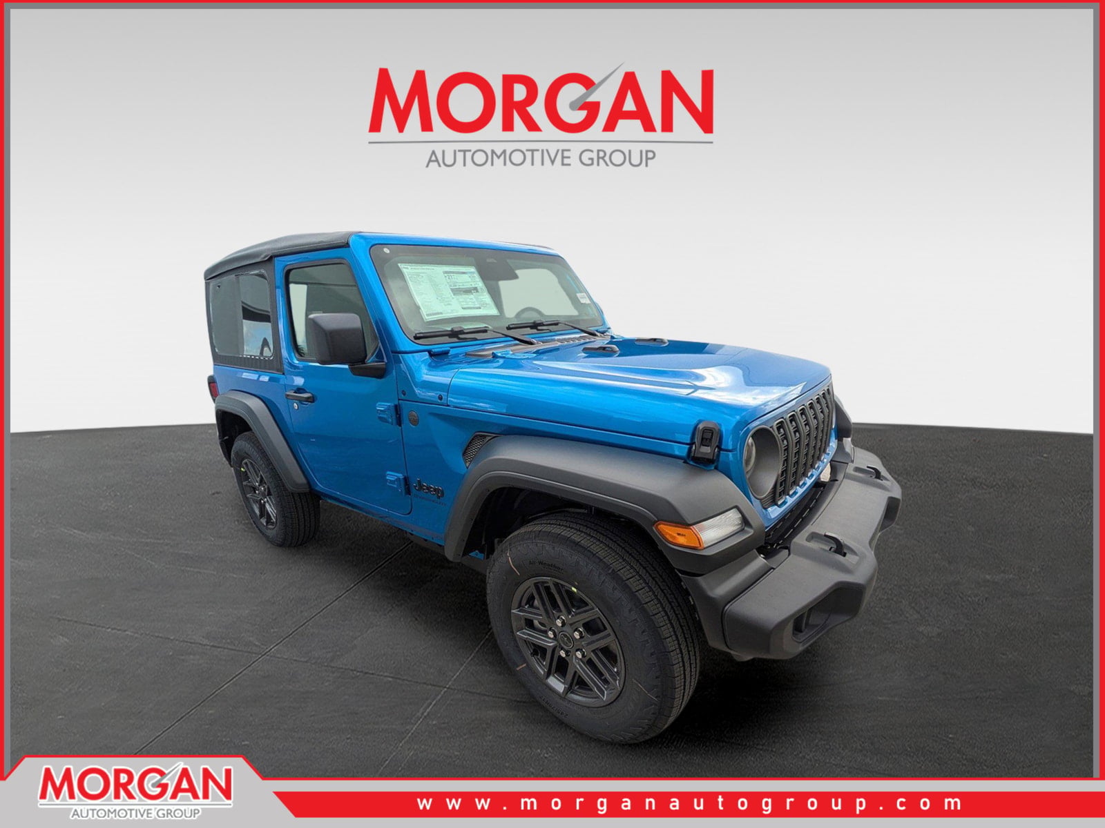 2026 Jeep Wrangler Sport S in Hydro Blue Pearlcoat — front three-quarter view
