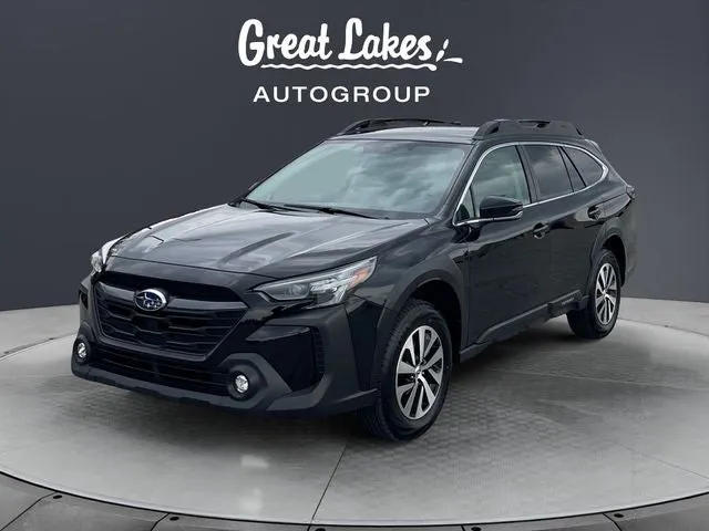 2025 Subaru Outback Premium in Crystal Black Silica — front three-quarter view