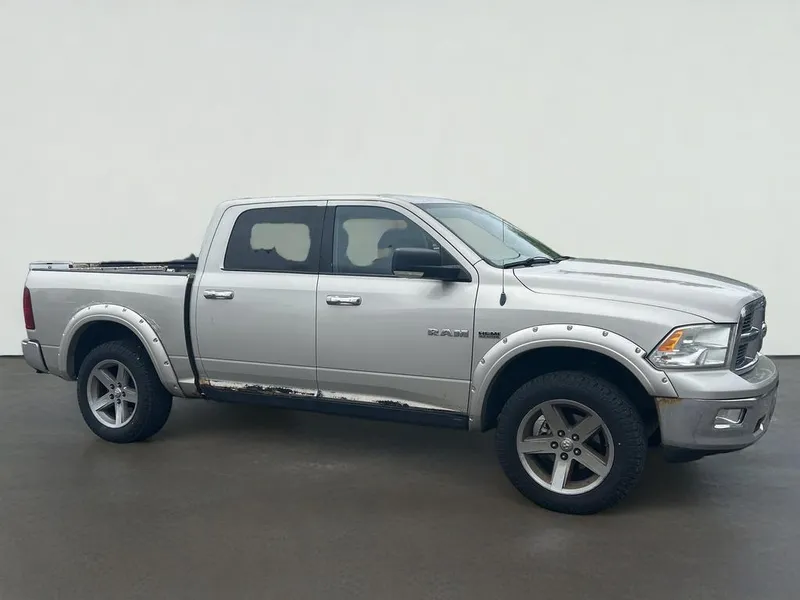 2010 Dodge Ram 1500 SLT/Sport/TRX in Silver — front three-quarter view