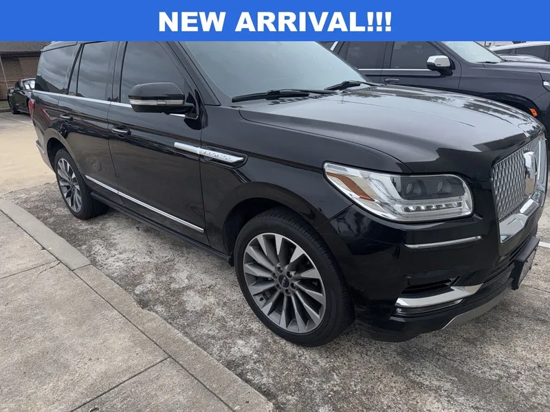 2021 Lincoln Navigator Reserve in Black — front three-quarter view