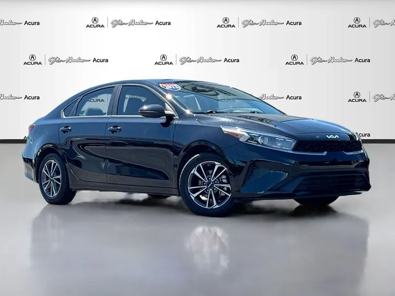 2023 Kia Forte LXS in Aurora Black — front three-quarter view