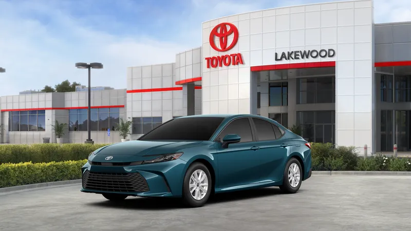 2026 Toyota Camry LE AWD in Ocean Gem — front three-quarter view