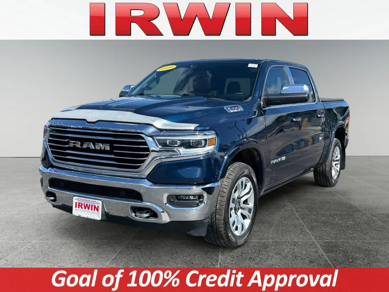 2019 RAM 1500 Longhorn in Patriot Blue Pearlcoat — front three-quarter view