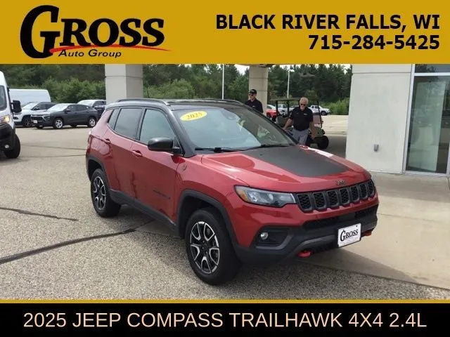 2025 Jeep Compass Trailhawk in Red Hot Pearlcoat — front three-quarter view