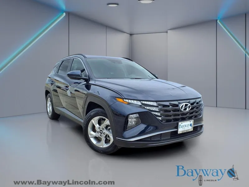 2024 Hyundai Tucson SEL in Deep Sea — front three-quarter view