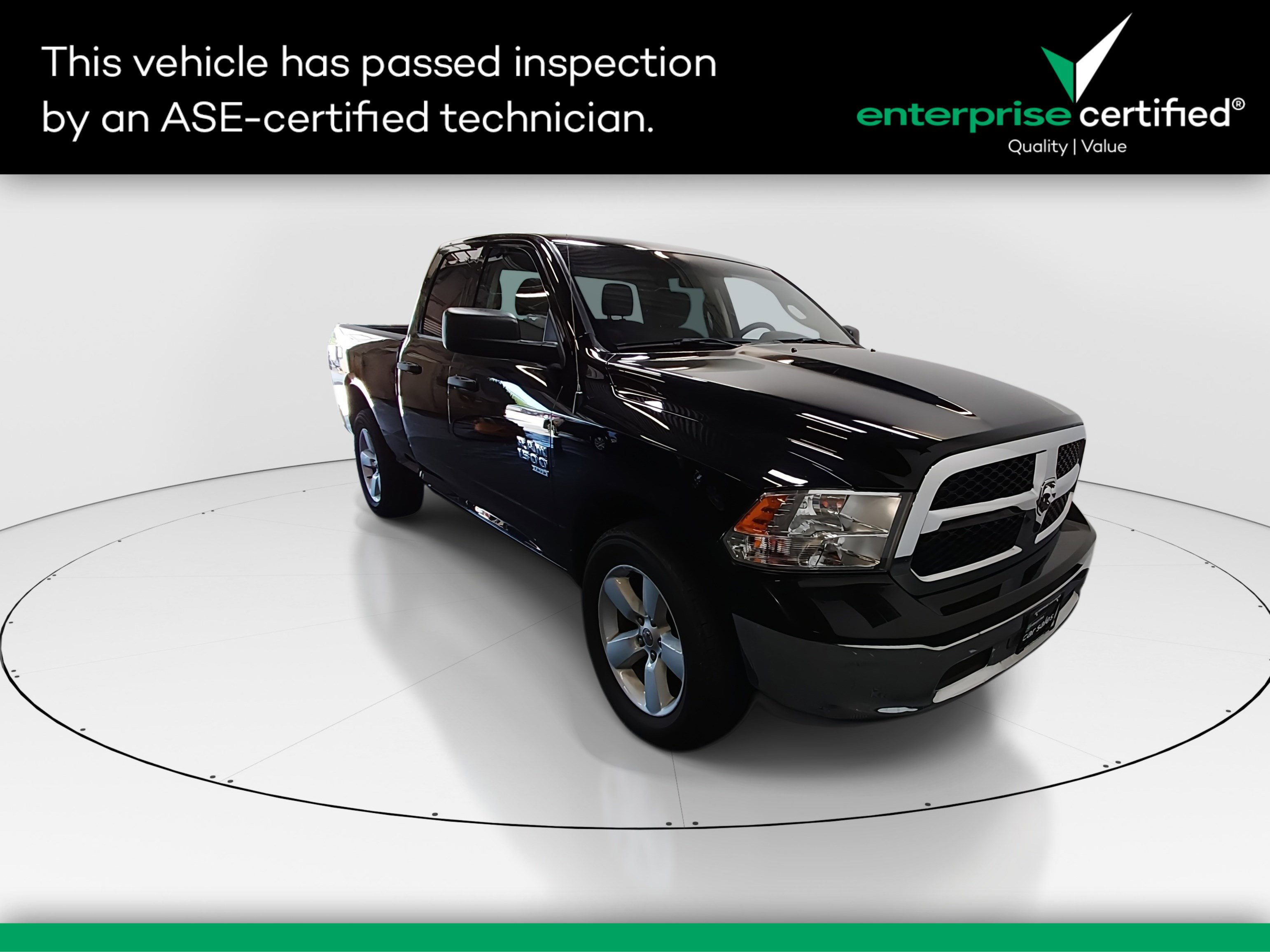 2024 Ram 1500 Classic SLT 4x4 Quad Cab 6'4" Box — front three-quarter view