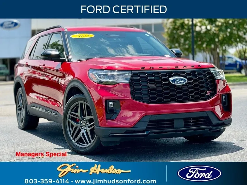2025 Ford Explorer ST CERTIFIED PANO ROOF MULTICONTOUR SEATS in Red Metallic — front three-quarter view