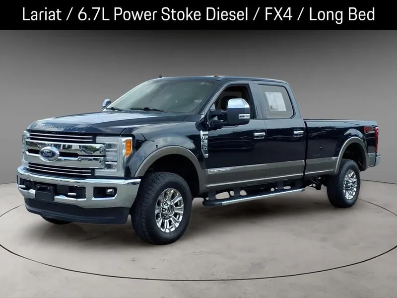 2019 Ford F-350SD Lariat in Agate Black Metallic — front three-quarter view